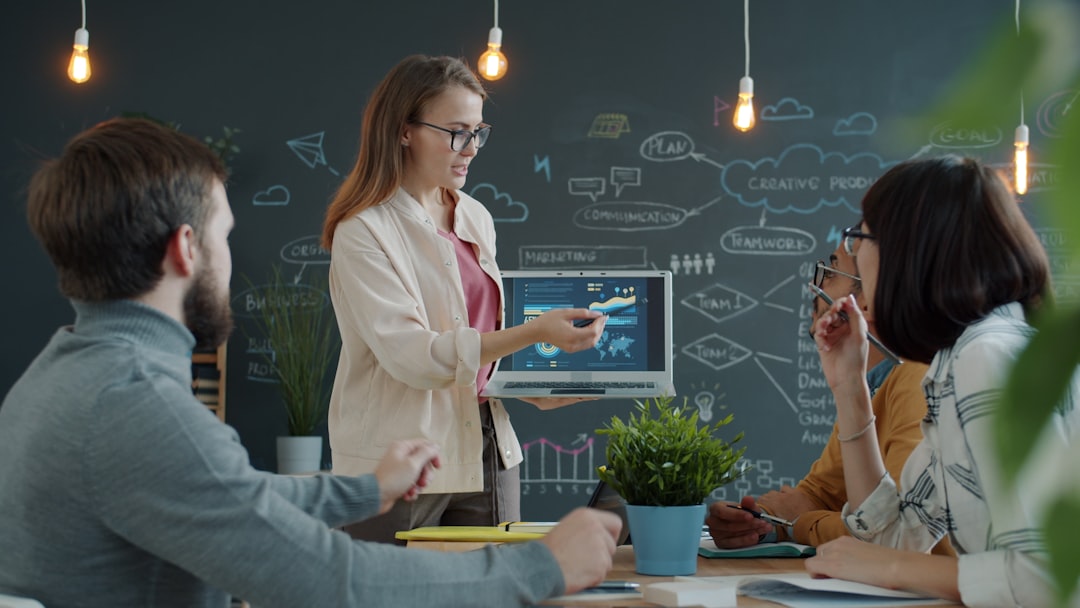 Woman presenting a business strategy to colleagues